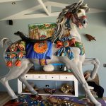 Isabelline - Carousel Horse. This horse standing 1600 cm high was originally a Christmas horse in a David Jones window display. - green and gold. After cleaning it , it was repainted grey, I added a new base and then decoupaged it in Renaissance  style. It was finished with 3 coats of lacquer.